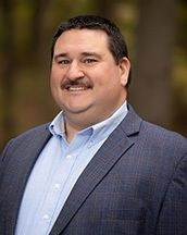 Headshot of Andrew Calvin